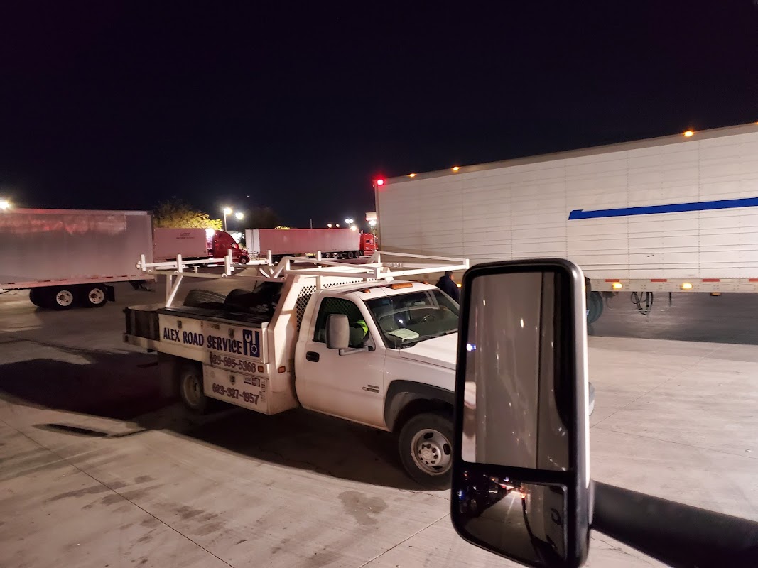 Alex Road Service truck at night — roadside diesel repair